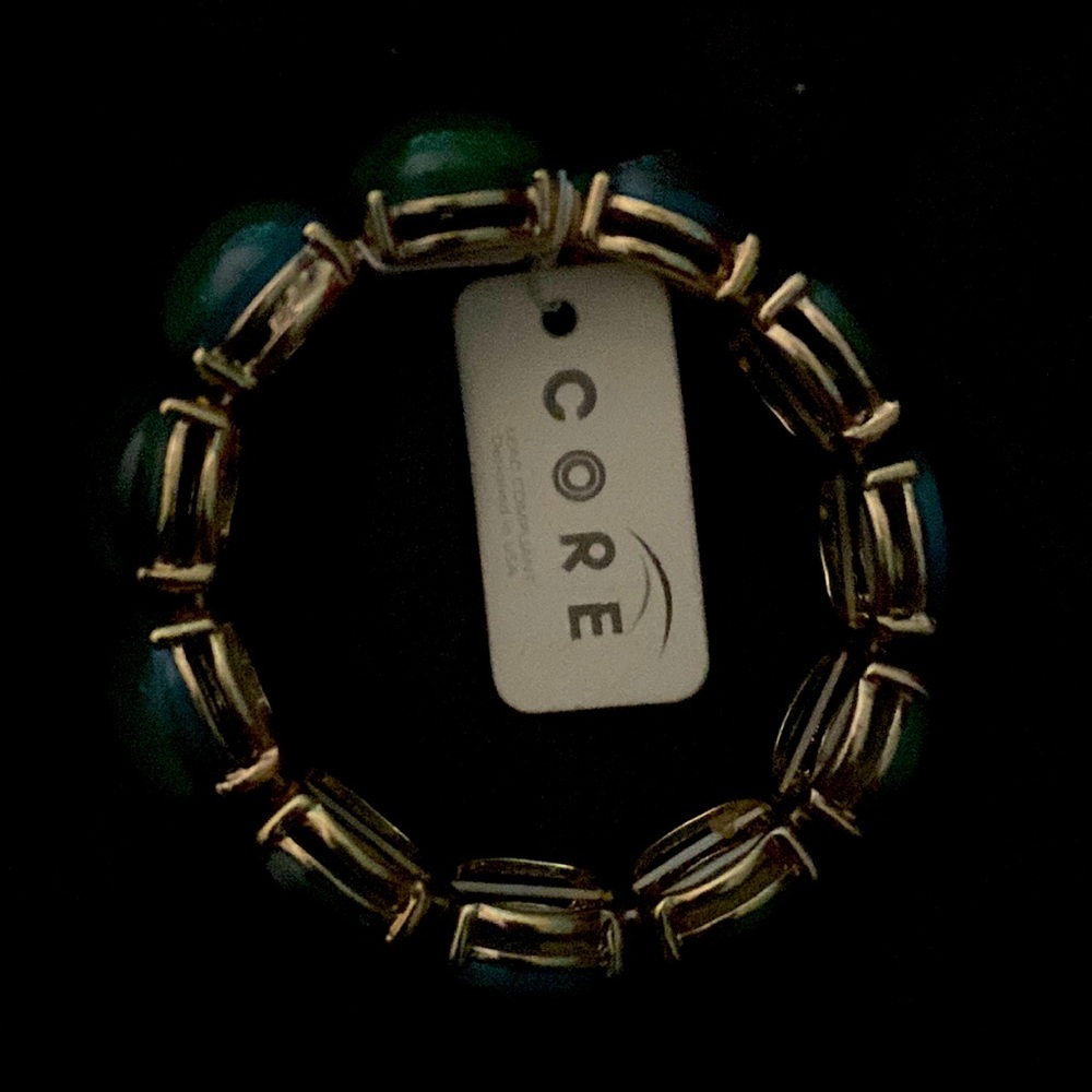 Core Green circle lead compliant bracelet.